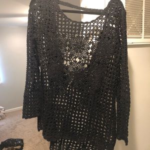 Free People black crochet sweater- size Medium.